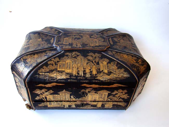 A fine large 19th century Chinese black and gold lacquer sewing box loaded with the original period accessories